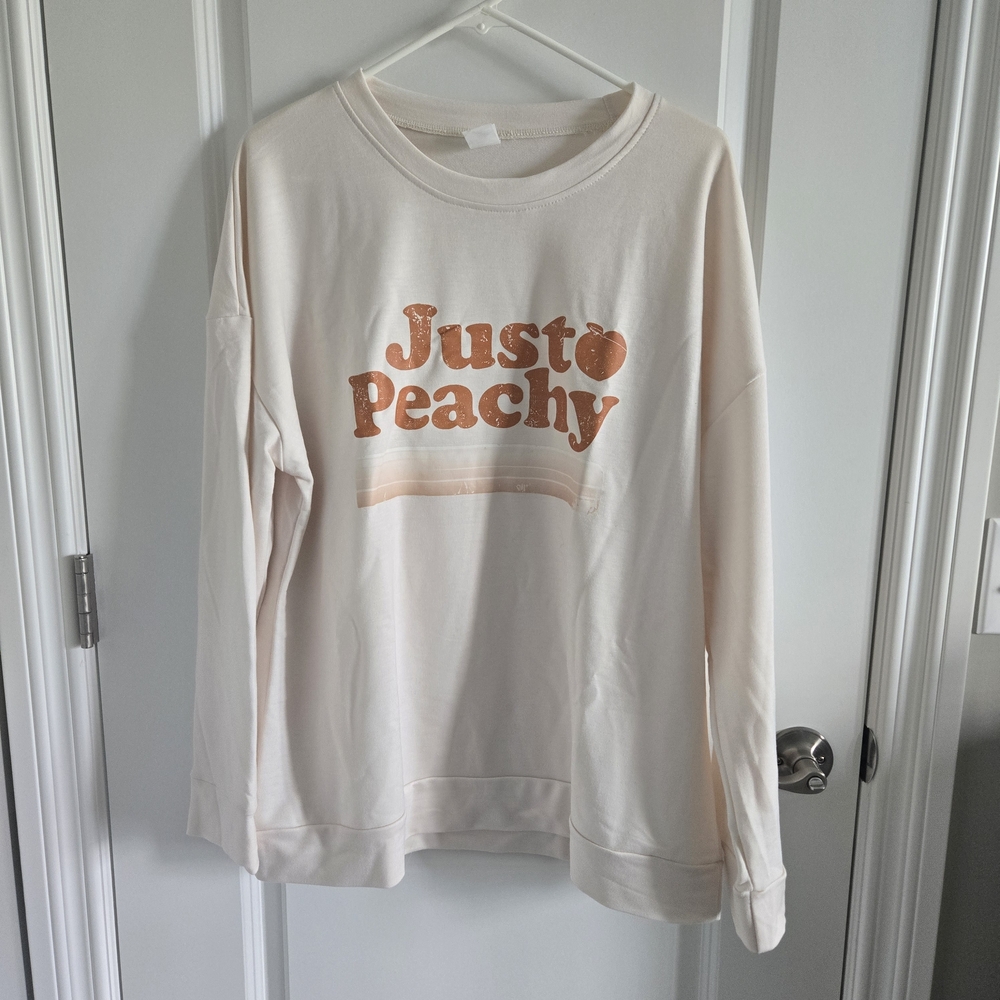 Just Peachy Cream Sweatshirt